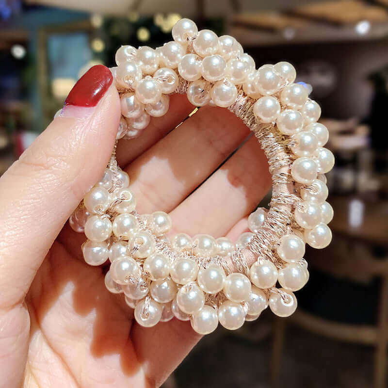 https://whisperwanda.com/products/girls-pearl-headdress-jewelry-hair-tie