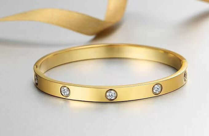 https://whisperwanda.com/products/bracelet-en-or-14k-et-acier-inoxydable-pour-femmes